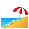 Plage avec parasol
