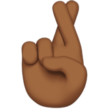Crossed Fingers: Medium-Dark Skin Tone on Apple iOS 11.3