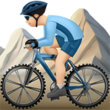 Person Mountain Biking: Light Skin Tone on Apple iOS 13.1