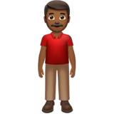 Man Standing: Medium-Dark Skin Tone on Apple iOS 13.2