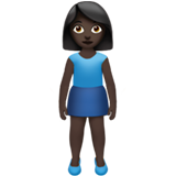 Woman Standing: Dark Skin Tone on Apple iOS 13.2