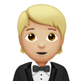 Person in Tuxedo: Medium-Light Skin Tone on Apple iOS 14.2