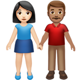 Woman and Man Holding Hands: Light Skin Tone, Medium Skin Tone on Apple iOS 14.2