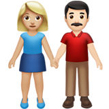 Woman and Man Holding Hands: Medium-Light Skin Tone, Light Skin Tone on Apple iOS 14.2