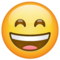 Grinning Face with Smiling Eyes on WhatsApp 