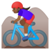 Woman Mountain Biking: Medium-Dark Skin Tone